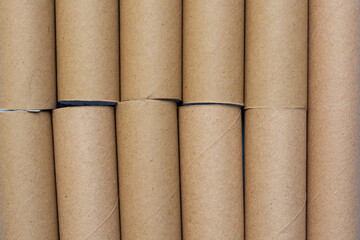 Empty toilet rolls on light blue background