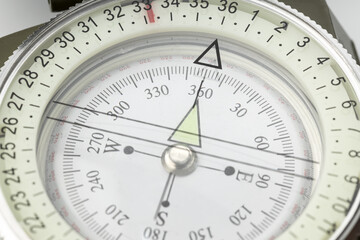 Close up of a compass. Guidance concept