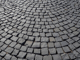 pavement covered with paving stones in a semicircular pattern