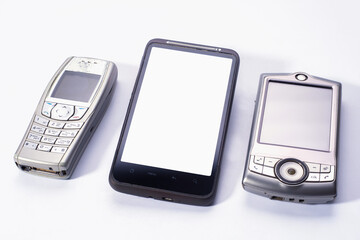 The old mobile phone is out of date. Touch screen. Light background.