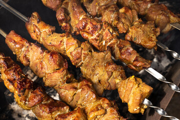 Beautiful and juicy barbecue on the grill, grilled meat