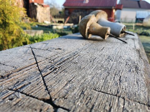 old wooden board in cracks and bitches early spring frost