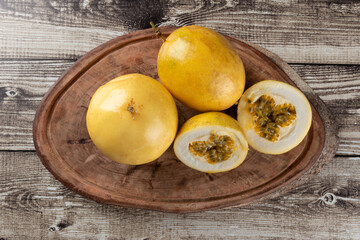 Passion fruit cut on wood top view