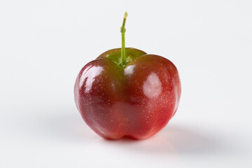acerola fruit isolated over white background