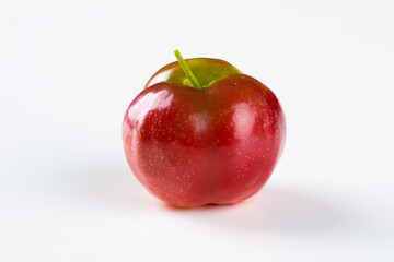 acerola fruit isolated over white background