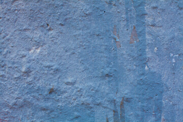 Old blue stucco plaster wall background. Grunge cement concrete wall texture