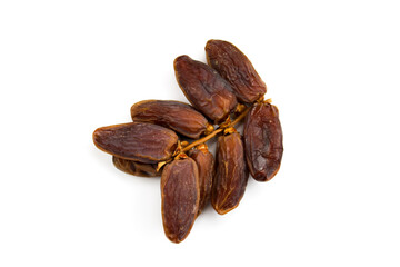Twig with date fruits. Fruit dates. Dates isolated on a white background. Twig with dates close up, macro.