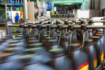 Oil is dispensed into quart bottles