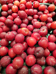 Palm Fresh fruits on basket for sale. Fruit background.