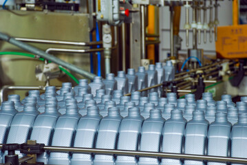 Oil is dispensed into quart bottles