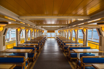 Odaiba water ferry interior design of seating area within boat. Tokyo, Japan.