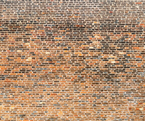 Fortress wall of red and black bricks