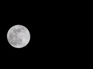 full moon over black