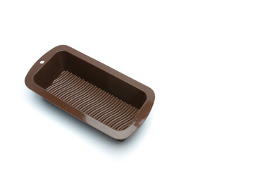 The silicone baking dish is insulated against a white background