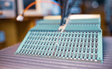 Close-up side view of a panel of SMD resistors