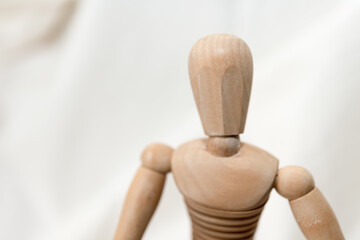 isolated wooden mannequin, mannikin, manikin - close up: head, neck, and torso
