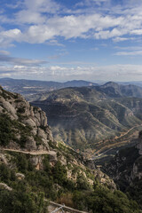 Fototapeta na wymiar Picturesque landscape of Montserrat Rocky Mountain. View from Montserrat Benedictine abbey nearby Barcelona. Montserrat, Catalonia, Spain.