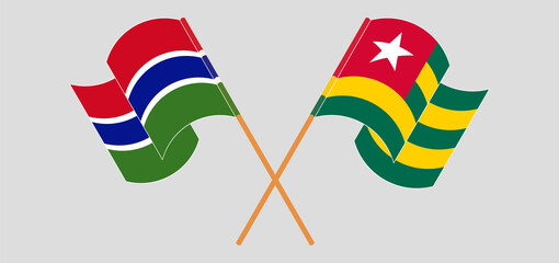 Crossed and waving flags of the Gambia and Togo