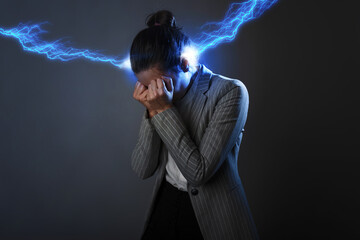 Headache and severe stress, concept. A lightning strike to the head,