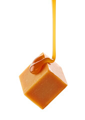 caramel sauce flowing on flying caramel candy
