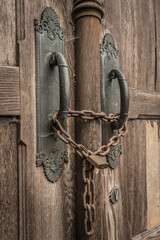 historic door with chain and padlock