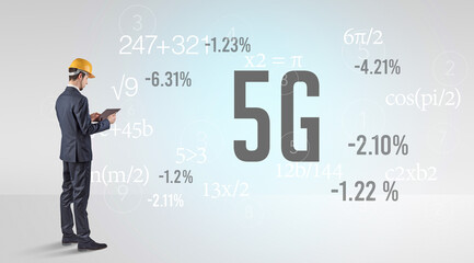 Engineer in hard hat with abbreviation