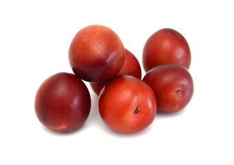 Red plum fruit isolated on white background