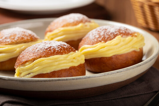 Berlin balls. Bread stuffed with icing cream.