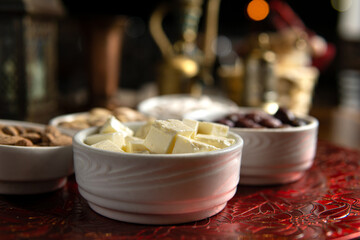 Cheese fresh snacks, nuts and seeds, olives, close up
