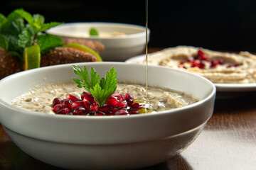 Traditional Middle Eastern food. Lebanese food. Arabian Baba Ghanoush with Pomegranate seeds