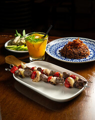 Traditional Middle Eastern food. Lebanese food. Arabian lamb barbecue, Mujadara rice and cabbage malfuf, drink