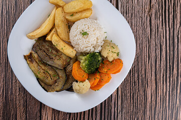 Dish Made - Oven-baked eggplant with spices, rice, rustic potatoes, carrots, cauliflower and brocolis
