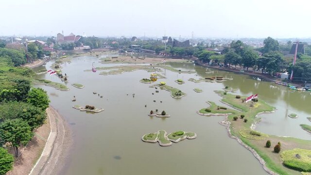 Cable Car above Miniature of Indonesia at Taman Mini Indonesia Indah. Taman Mini "Indonesia Indah" is a culture-based recreational area located in East Jakarta, Indonesia.
