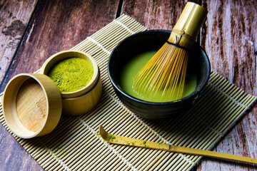 Matcha Green Tea and Japanese tea set on Wooden Background 