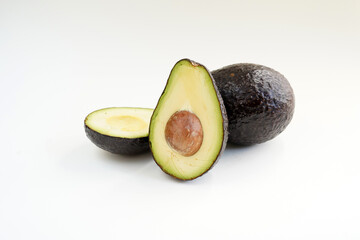 Organic fresh green avocado white background