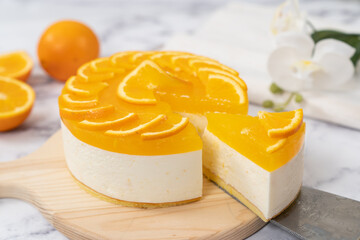 No baked orange cheese cake with fresh oranges decoration - obrazy, fototapety, plakaty