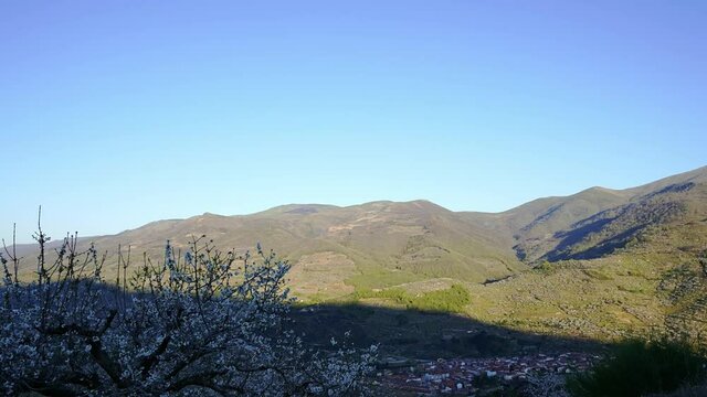 Time-lapse, light and shadow flowing at sunrise in Jerte valley, Spain