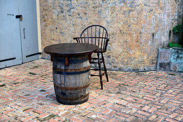 Naklejka premium Chair and Old barrel table