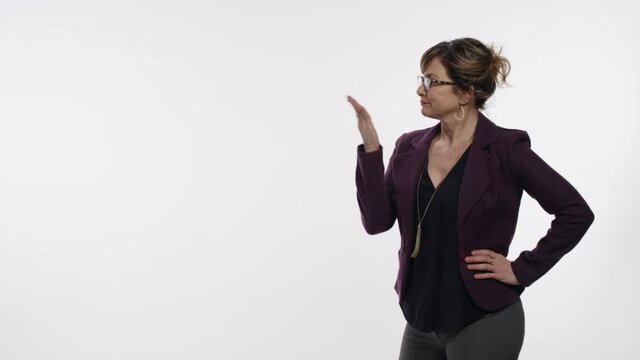 Businesswoman cues up a graphic on white space