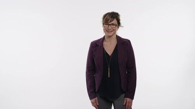 Professional woman smiles and nods with graphic logo space on white