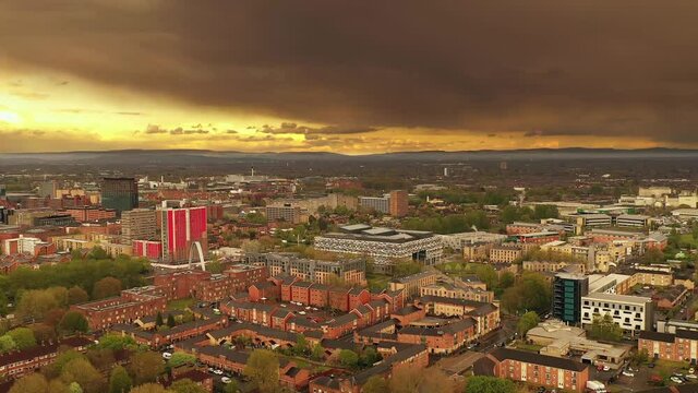 Aerial drone shot rising over classic typical British English town and housing