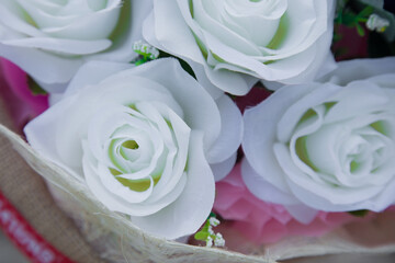 Floral background. Lot of artificial flowers in colorful composition,closeup flowers background