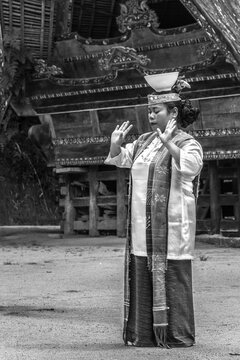 Samosir, Indonesia &ndash; May 7, 2015: Tortor Dance Performance, one of the typical dances of the Batak tribe, for tourists on Samosir Island Toba Lake, North Sumatera, Indonesia