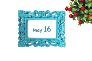 Day 16 of May month, Wooden vintage frame isolated on white background. Empty space for text.