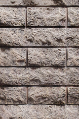 Closeup background of modern brown tile wall texture
