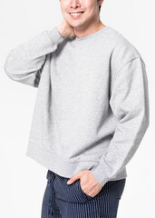 Man in gray sweater and pants sleepwear apparel