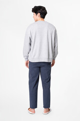 Fototapeta premium Man in gray sweater and pants sleepwear apparel rear view