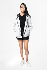 Asian woman in gray windbreaker jacket sportswear apparel full body © Rawpixel.com
