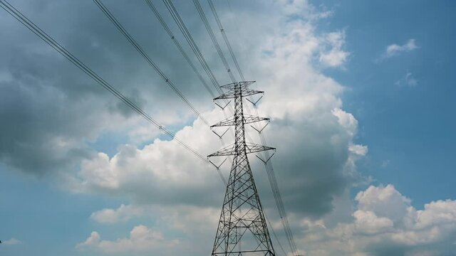 Electricity concept, Close up high voltage power lines station. High voltage electric transmission pylon silhouetted tower.	
