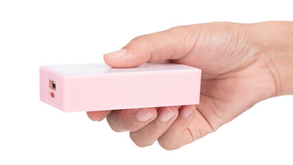 Hand holding DIY Power Bank isolated on white background.